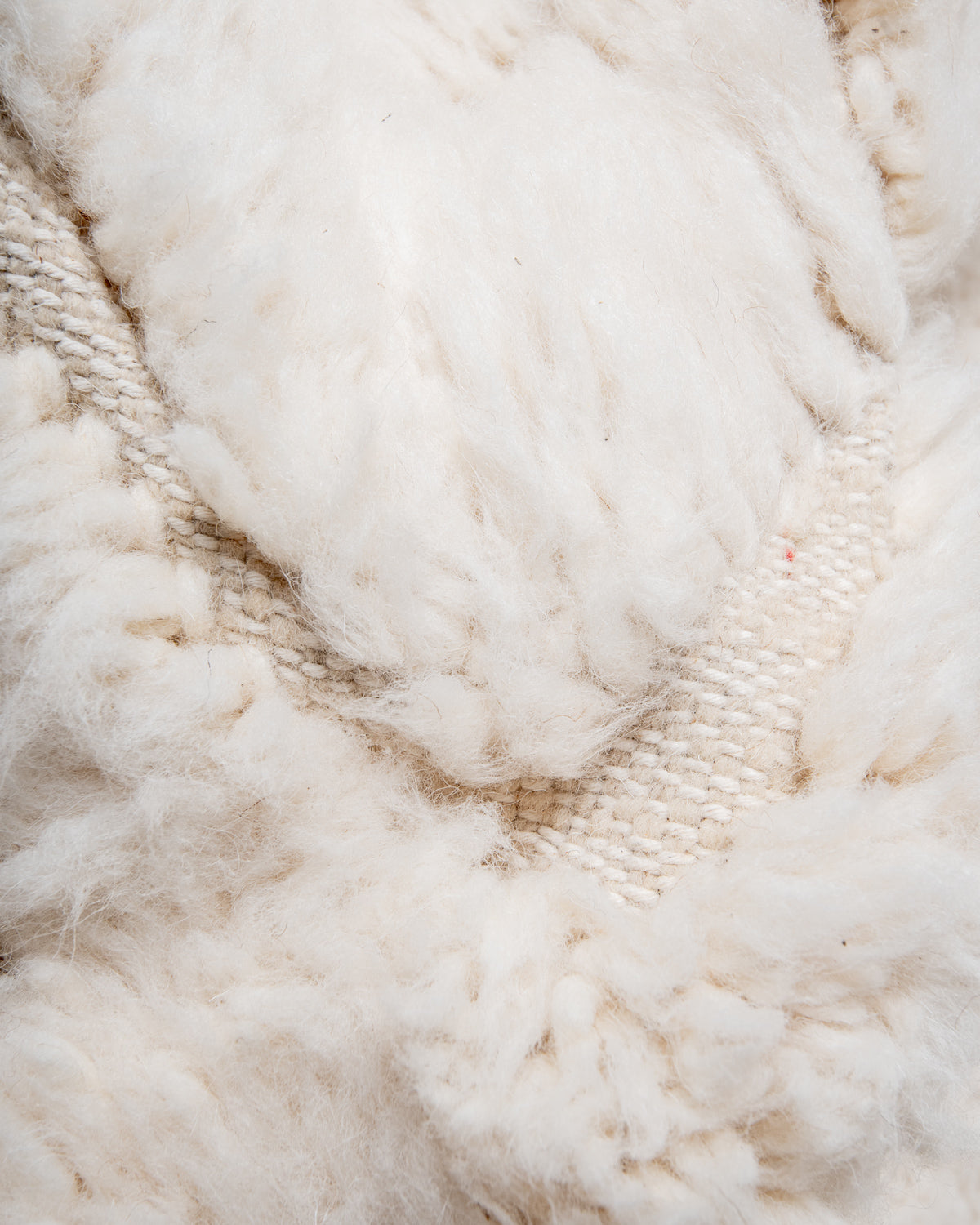 Modern, designer, handcrafted Berber rug from Morocco. Beniourain carpet with beautiful colours and patterns and fluffy wool texture.